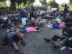 Migrants, who are part of a caravan heading toward the country's northern border and ultimately the United States, rest on the outskirts of Escuintla, southern Mexico, Thursday, Nov. 7, 2024.