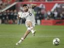 Toronto FC's Jonathan Osorio scores on his penalty kick against the New York Red Bulls during a Leagues Cup soccer match at Red Bull Arena, on Saturday, July 27, 2024, in Harrison, N.J.