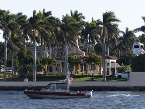 A Coast Guard patrol boat cruises near Mar-a-Lago, President-elect Donald Trump's Palm Beach home, in Palm Beach, Fla., Saturday, Dec. 21, 2024.