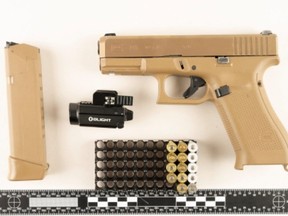 A weapon and ammunition seized by Peel Regional Police.