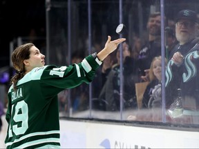 Hannah Bilka of the Boston Fleet tosses a puck