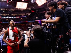 Scottie Barnes of the Toronto Raptors celebrates as he leaves the court after beating the Boston Celtics.