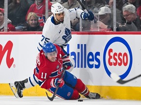 Toronto Maple Leafs Ryan Reaves beat Montreal Canadiens' Brendan Gallagher.