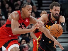 Toronto Raptors forward Scottie Barnes (4) steals the ball from Atlanta Hawks guard Trae Young.