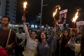 Protesters calling for the return of hostages held in the Gaza Strip react after a Gaza ceasefire and hostage release deal was reached on Jan. 15, 2025 in Tel Aviv, Israel. AMIR LEVY/GETTY IMAGES