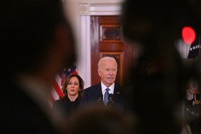 U.S. President Joe Biden, flanked by Vice President Kamala Harris, speaks about the Israel-Hamas ceasefire and hostage release deal in the Cross Hall of the White House on Jan. 15, 2025. ROBERTO SCHMIDT/GETTY IMAGES