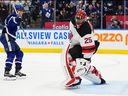 Toronto Maple Leafs' William Nylander (88) scores on New Jersey Devils goaltender Jacob Markstrom (25) during overtime NHL hockey action in Toronto on Thursday, January 16, 2025.