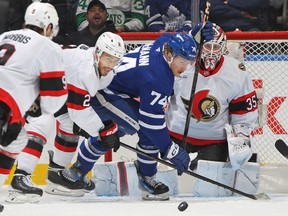 Maple Leafs forward Bobby McMann (74) competes for the puck against the Senators during third period NHL action at Scotiabank Arena in Toronto, Nov. 12, 2024.