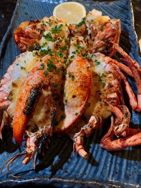 Komodo star of the show is the Maine lobster kamikaze — expertly grilled, stuffed with a creamy blend of earthy enoki mushrooms and osetra caviar, then drizzled with a spicy aioli.