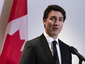 Prime Minister Justin Trudeau speaks to the media after a meeting with the President and CEO of The National Association of Manufacturers Jay Timmons in Washington on Jan. 9, 2025.