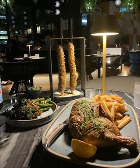 Charred broccolini, pistachio-crusted kebabs and Harissa Giguere chicken made for a delicious dinner at Skylight at W Toronto hotel. JANE STEVENSON/TORONTO SUN