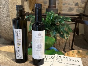 Bottles of Olio di Calabria IGP extra virgin olive oil.