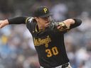 Pittsburgh Pirates pitcher Paul Skens (30) pitches during the second inning of a baseball game against the New York Yankees on September 28, 2024, in New York.