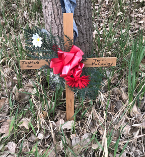 REMEMBER: A makeshift memorial to murdered mother of two Terri McCauley. Cops say theyve arrested her killer after more than 40 years. FACEBOOK