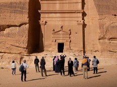 Tourists at the ancient Nabataean site of Hegra in AlUla, Saudi Arabia.