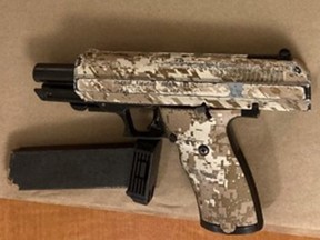 A weapon and ammunition seized by Toronto Police.