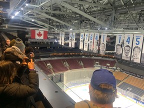 Fans look at the banners above the ice during a tour of Scotiabank Arena.