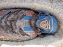 A handout picture released by the Egyptian Ministry of Antiquities on Nov. 28, 2018 shows newly-uncovered mummies dating back over 2,300 years that were found by Egyptian archaeologists at a pyramid complex south of Cairo.