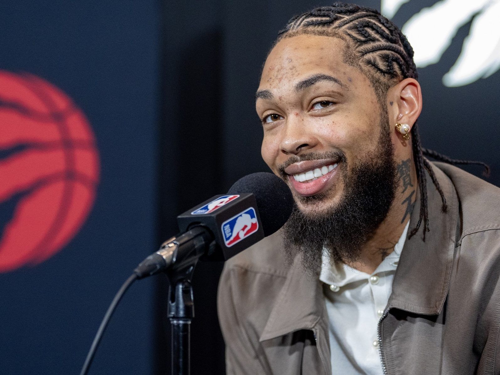 Toronto Raptors Brandon Ingram smiles while answering questions in Toronto on Wednesday.
