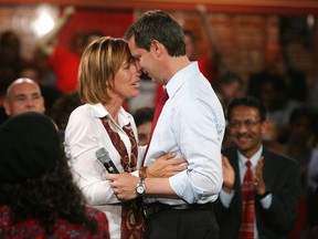 Ontario Premier Dalton McGuinty and his wife Terri embrace.