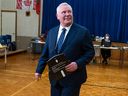 Progressive Conservative Leader Doug Ford prepares to vote in the Ontario provincial election, at Westmount Junior School in Etobicoke, Ont., on Thursday, Feb. 27, 2025.