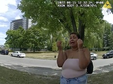 Daniella Mallia speaks to Toronto Police officers.