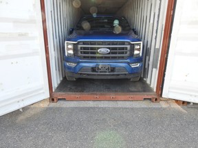 Stolen car in a sea container.