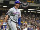 Pete Alonso of the New York Mets reacts after hitting a three-run home run during the ninth inning of Game 3 of the National League Wild Card game last season.