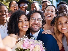 The mother of the bride is hurt after she was left out of a group wedding photo.