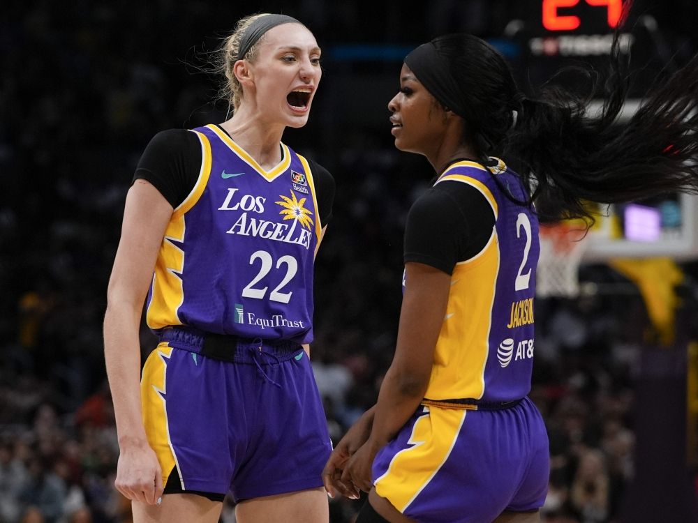 Los Angeles Sparks forward Cameron Brink (left) reacts after forward Rickea Jackson drew a foul during a game.