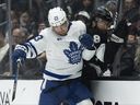 Toronto Maple Leaf Leaf left wing Matthew Knies checked Los Angeles Kings defensive player Drew Doughty in the first phase of the NHL game in Los Angeles on March 29, 2025.
