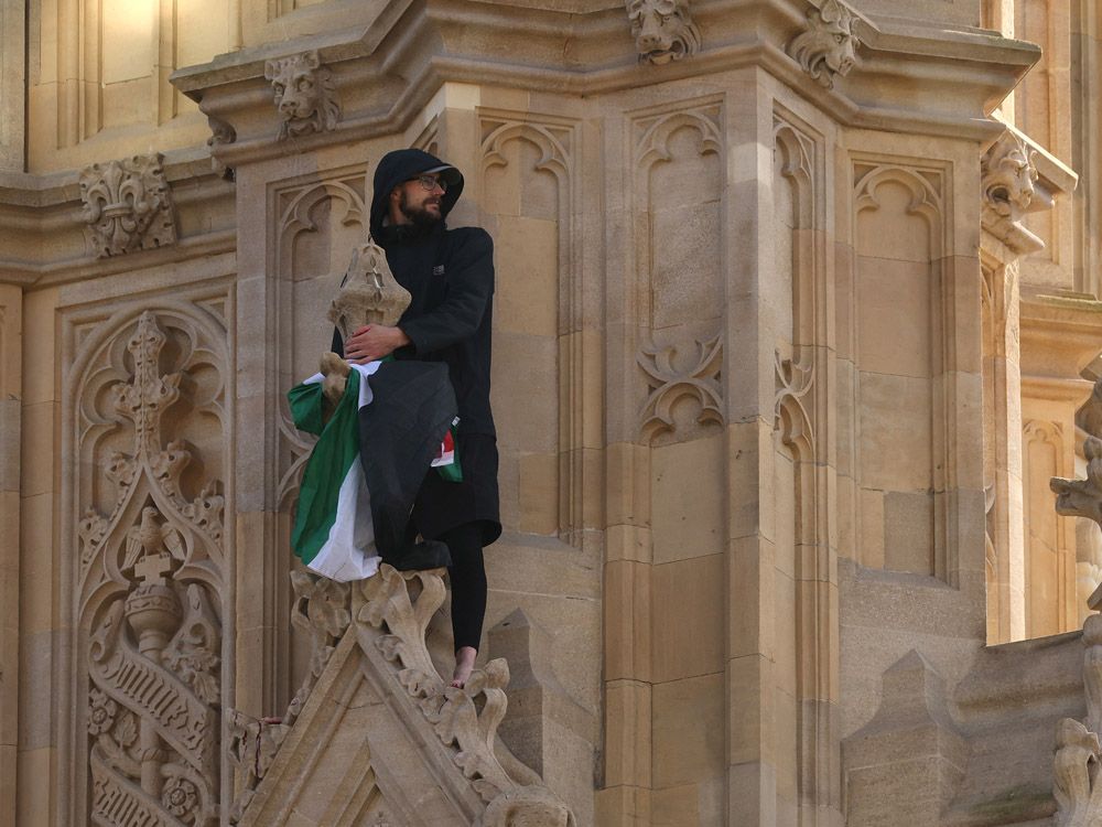 Emergency services respond after man with Palestinian flag climbs Big Ben tower