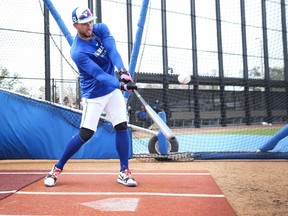 Toronto Blue Jays outfielder George Springer hits the ball.