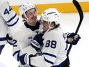 William Nylander of Toronto Maple Leafs (88) celebrated his game overtime goal with Simon Benoit (2) at the end of his NHL hockey game against Pittsburgh on Sunday, March 2, 2025.