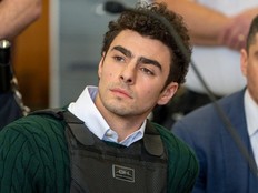 Luigi Mangione attends a hearing at Manhattan Criminal Court on February 21, 2025 in New York City.