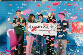 GTA construction company workers celebrate winning $60 million Lotto Max draw from Jan. 21, 2025. OLG phooto