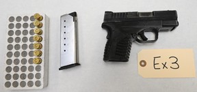 A firearm was recovered by Hamilton Police following an early Friday morning home invasion.
