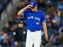 The Blue Jays reacted on the mound in the first inning against the Orioles at the Rogers Center in Toronto on Saturday, March 29, 2025.