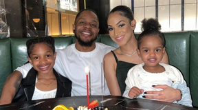Jevon Harris-Smith, pictured with his partner and daughters in an image from GoFundMe.