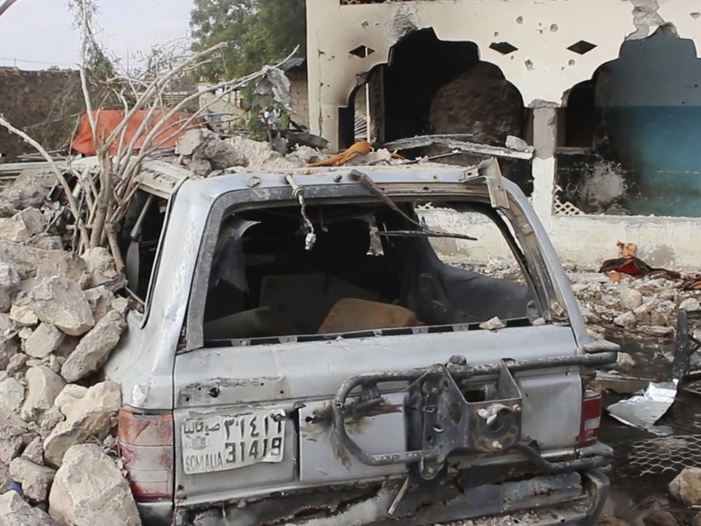  Frame grab from video shot Wednesday, March 12, 2025, showing the aftermath of a car bomb exploded Tuesday at a hotel in the central Somali city of Beledweyne.