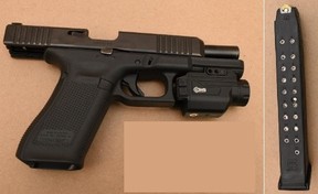Toronto Police said a loaded Glock handgun with an extended magazine was seized during a high-risk takedown in North York on Wednesday, March 12, 2025.