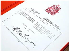 An order-in-council to eliminate the consumer carbon tax, that was signed by Prime Minister Mark Carney on Friday, March 14, 2025. Photo by Justin Tang/The Canadian Press