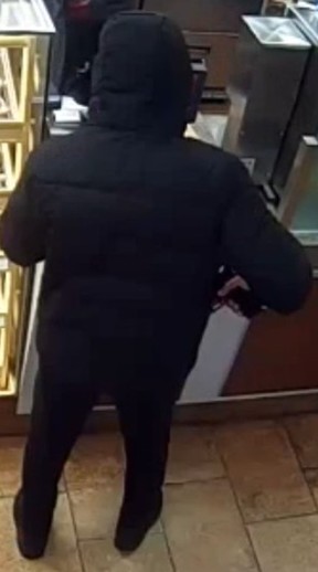 Investigators need help identifying this man who is suspected of committing three retails robberies in downtown Toronto between Dec. 5 and Dec. 11, 2024.