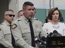 Santa Fe County Sheriff Adan Mendoza, the Center, answers questions about the investigation by actor Gene Hackman and his wife Betsy Arakawa during a press conference in Santa Fe, New Mexico.