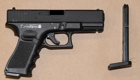 Police seized a hammer and a replica firearm. TORONTO POLICE HANDOUTS