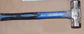 Police seized a hammer and a replica firearm. TORONTO POLICE HANDOUTS