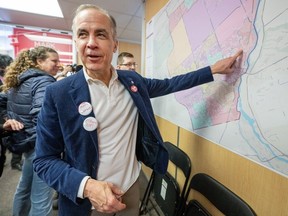 Liberal leader Mark Carney browsed Nepal’s riding map on Saturday, March 29, 2025 at his campaign office.