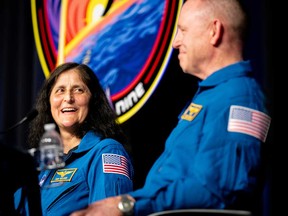 Astronauts Sunita "Suni" Williams, left, and Barry "Butch" Wilmore speak during a news conference at the NASA Johnson Space Center on March 31, 2025 in Houston, Texas.
