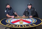 Toronto Police Constables Farhan Ali, left, and Haroon Siddiqui appearing on a now-deleted episode of the TPS-produced podcast