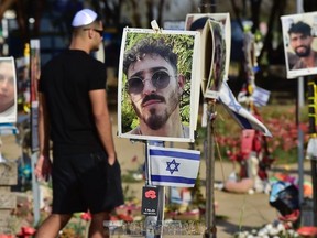 Photos and memorials of the over 360 Israelis murdered by Palestinian terrorists on Oct. 7, 2023 dot the site of the Supernova Music Festival, near Re’im, Israel, on Monday, March 17, 2025. (Bryan Passifiume, Toronto Sun)